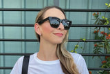 Woman wearing Ava, Black Oversized Square Sunglasses