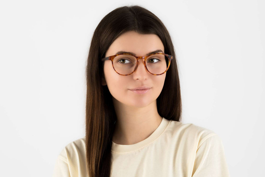 Woman wearing Hope Orange Eyeglasses