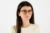 Woman wearing Fierce Brown, Clear Brown Thick Frame Glasses