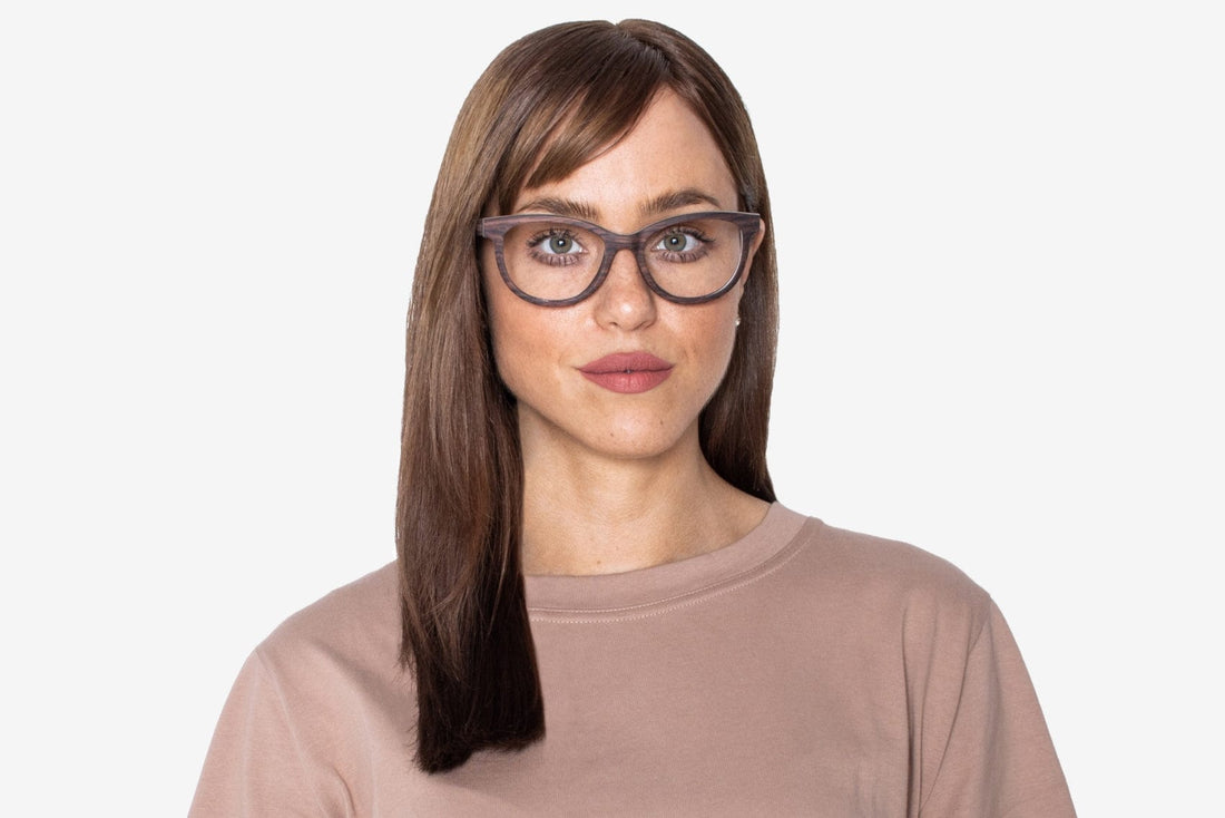 Woman wearing Charm Purple - Cat-Eye Eyeglasses made from Sandal Wood