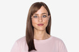 Woman wearing Joy Rose Gold, Rose Gold Metal Round Glasses