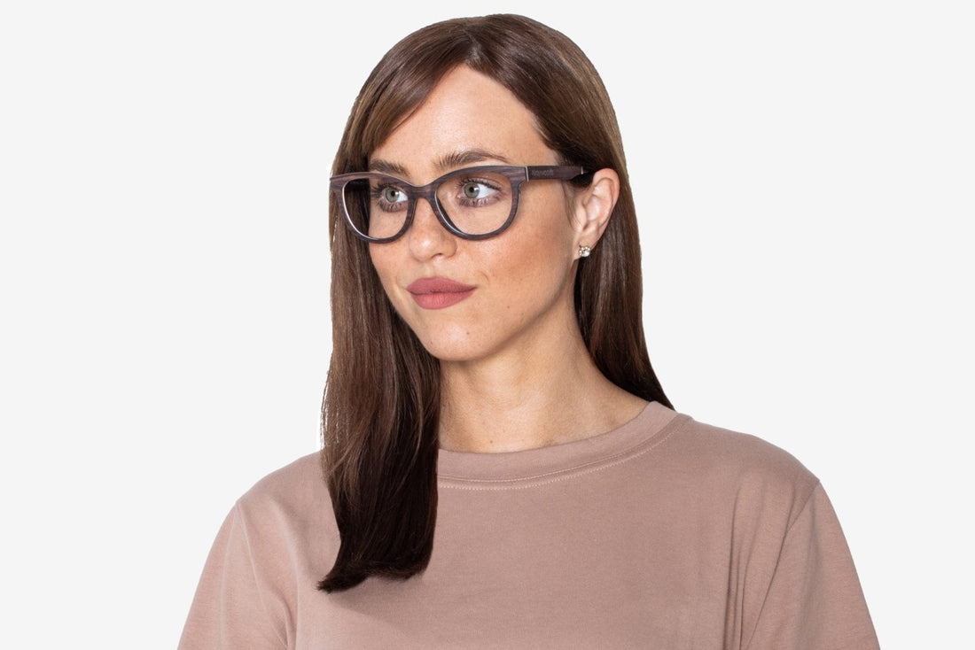 Woman wearing Charm Purple - Cat-Eye Eyeglasses made from Sandal Wood