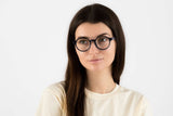 Woman wearing Wonder Navy, Geometric Round Navy Blue Acetate Glasses