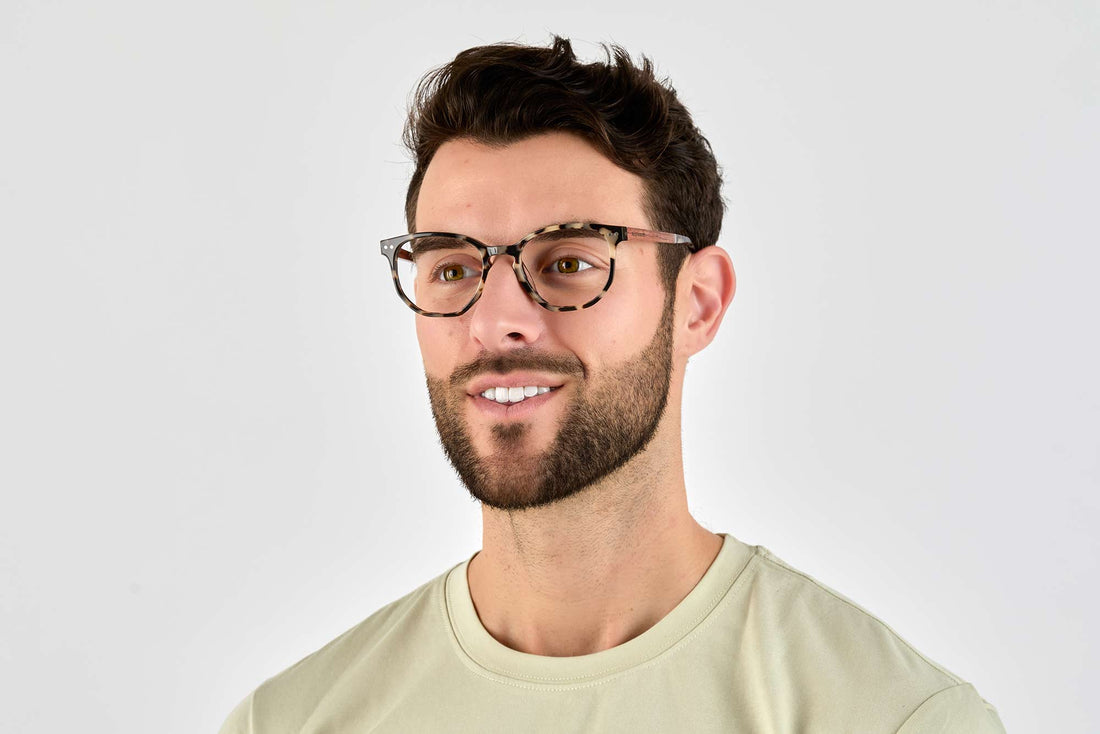 Man wearing Faith Ivory, Ivory Tortoise Geometric Glasses