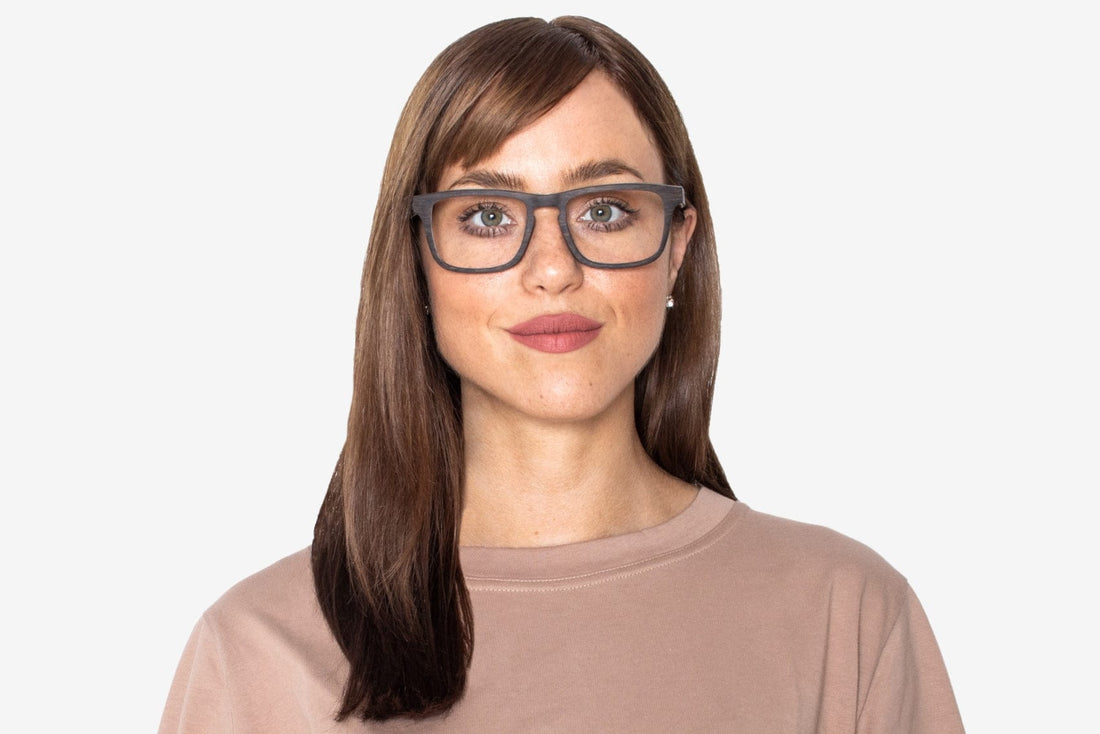 Woman wearing Bold Black, Rectangle Black Oak Wood Glasses