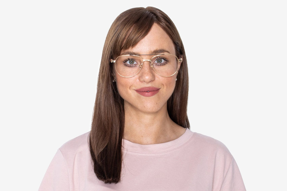 Woman wearing Purpose Gold - Vintage Aviator Eyeglasses in Gold Metal