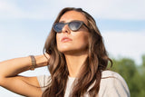 Woman wearing Selena, Small Cat Eye Sunglasses in Black