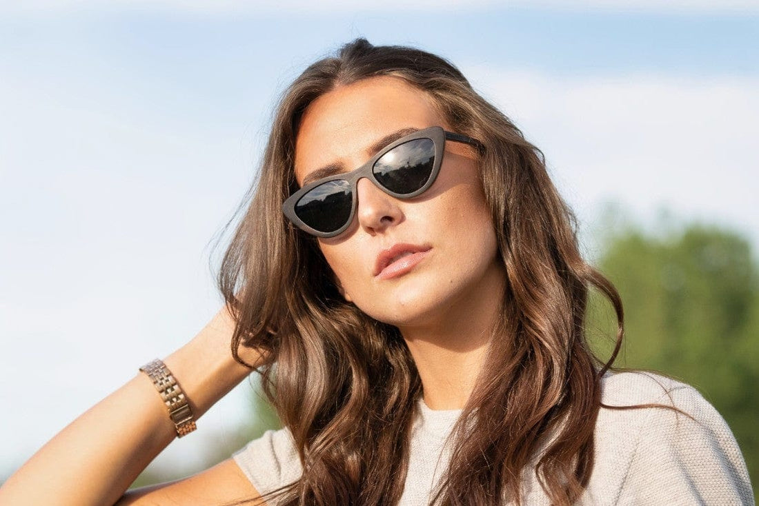 Woman wearing Selena, Small Cat Eye Sunglasses in Black