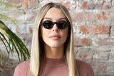 Woman wearing Magnolia, Small Round Wood Sunglasses