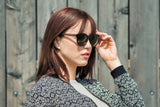 Woman wearing Luxy, Black Round Polarized Sunglasses